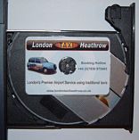 Laptop CD drive ejected with Business Card CD 
